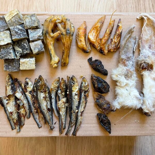 Natural Dog Treat Box Including 32 Natural Dog Chews and Treats. Rabbit Ears, Dried Sprats, Chicken Feet & Wings, Fish Cubes & Chicken Hearts or Bites. Suitable for Small, Medium and Large Adult Dogs. - Image 6