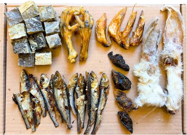 Natural Dog Treat Box Including 32 Natural Dog Chews and Treats. Rabbit Ears, Dried Sprats, Chicken Feet & Wings, Fish Cubes & Chicken Hearts or Bites. Suitable for Small, Medium and Large Adult Dogs. - Image 2